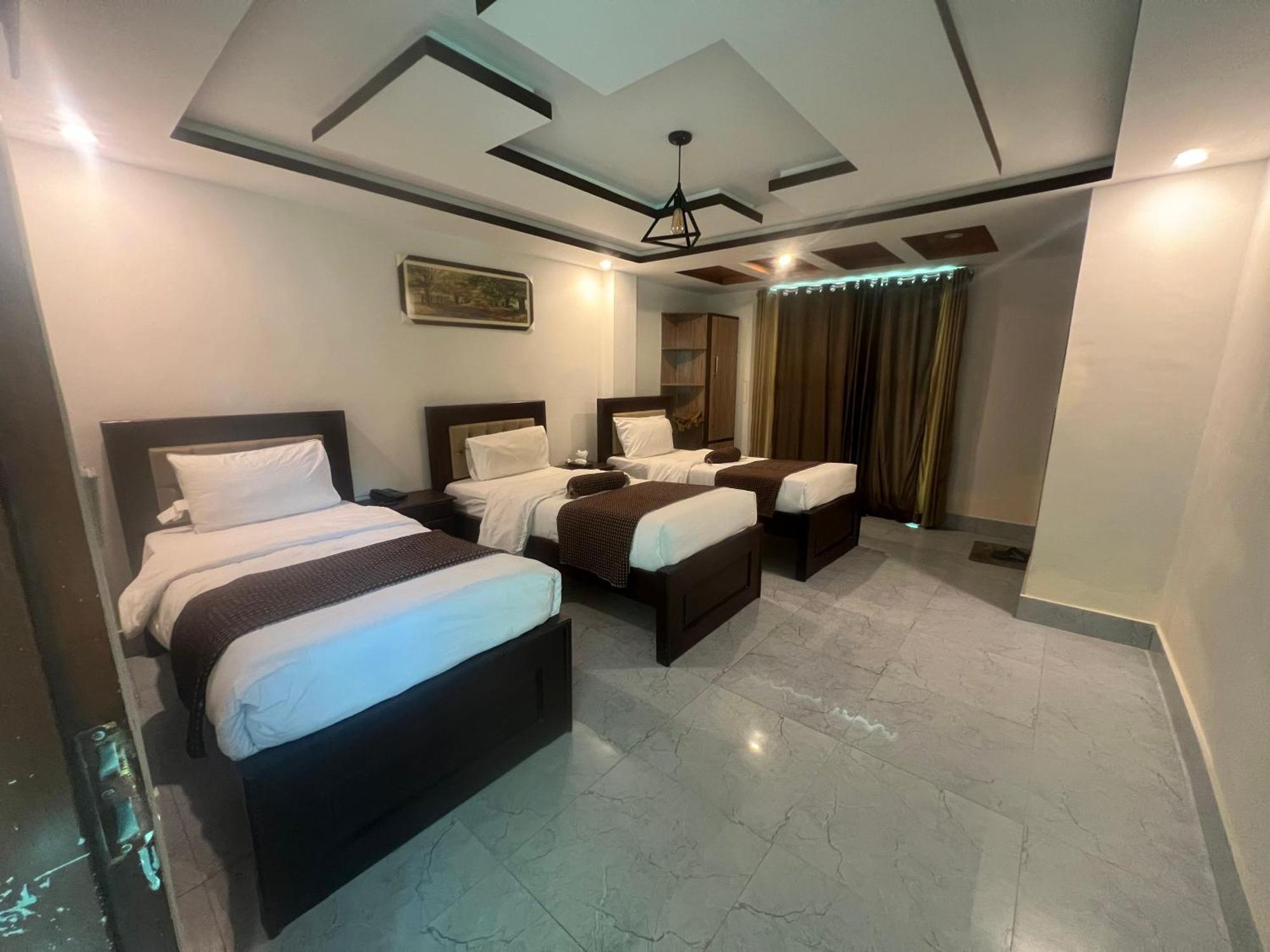 Hotel Birmingham Palace Kalam By Khan Familia Eksteriør billede